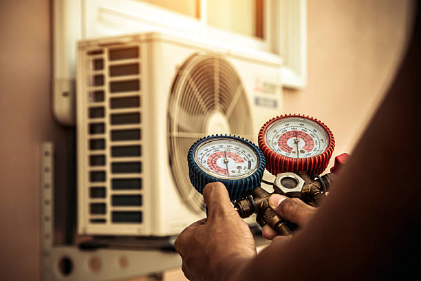 Professional Air Conditioning Service technician working in Prattville, AL